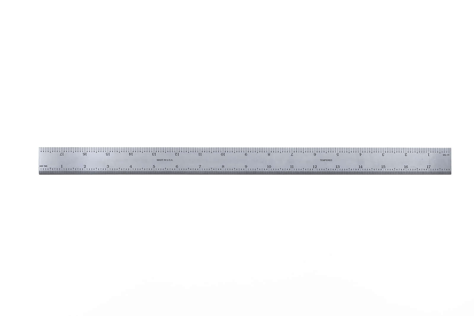 Rigid Satin Chrome Steel Rulers with English and Metric graduations for precision measuring.